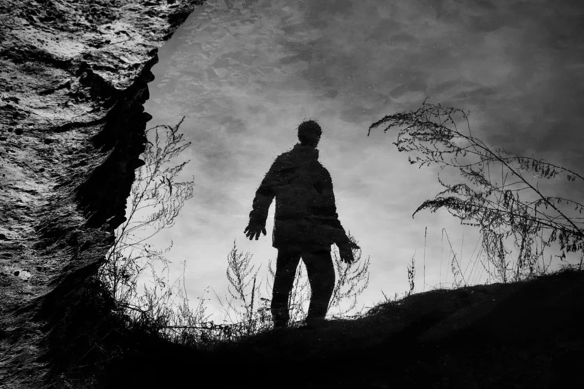 Reflective silhouette of a person in black and white, captured with Canon EOS 600D.