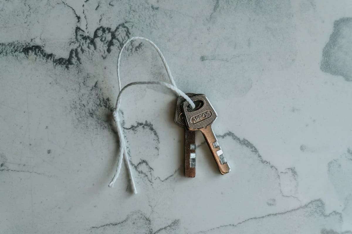 Car keys resting on a marble surface